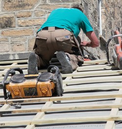 Contractor constructing a new roof